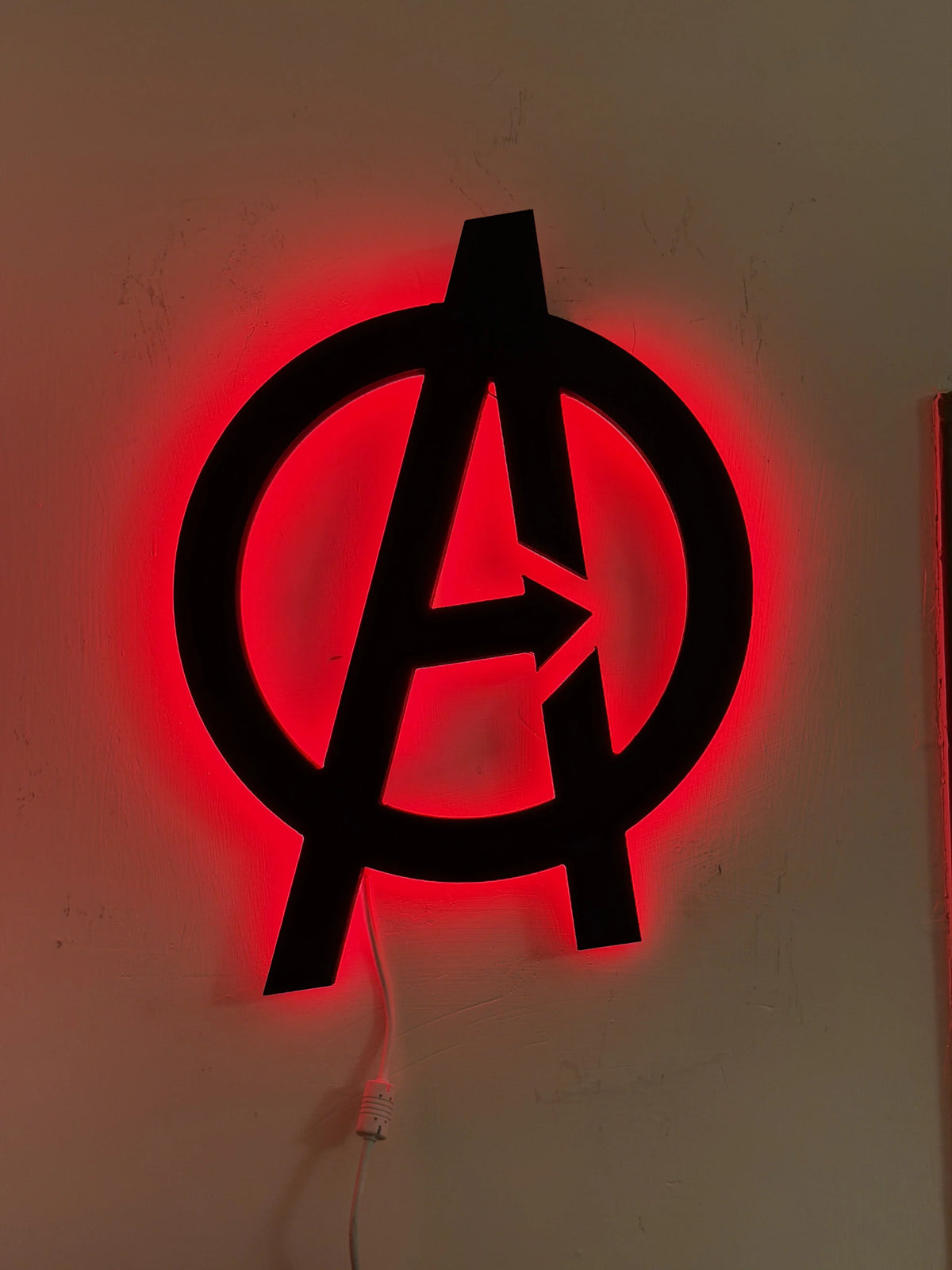 Black Avengers Spider Logo LED wall decoration by Evertrend, featuring illuminated superhero spider emblem for wall display.