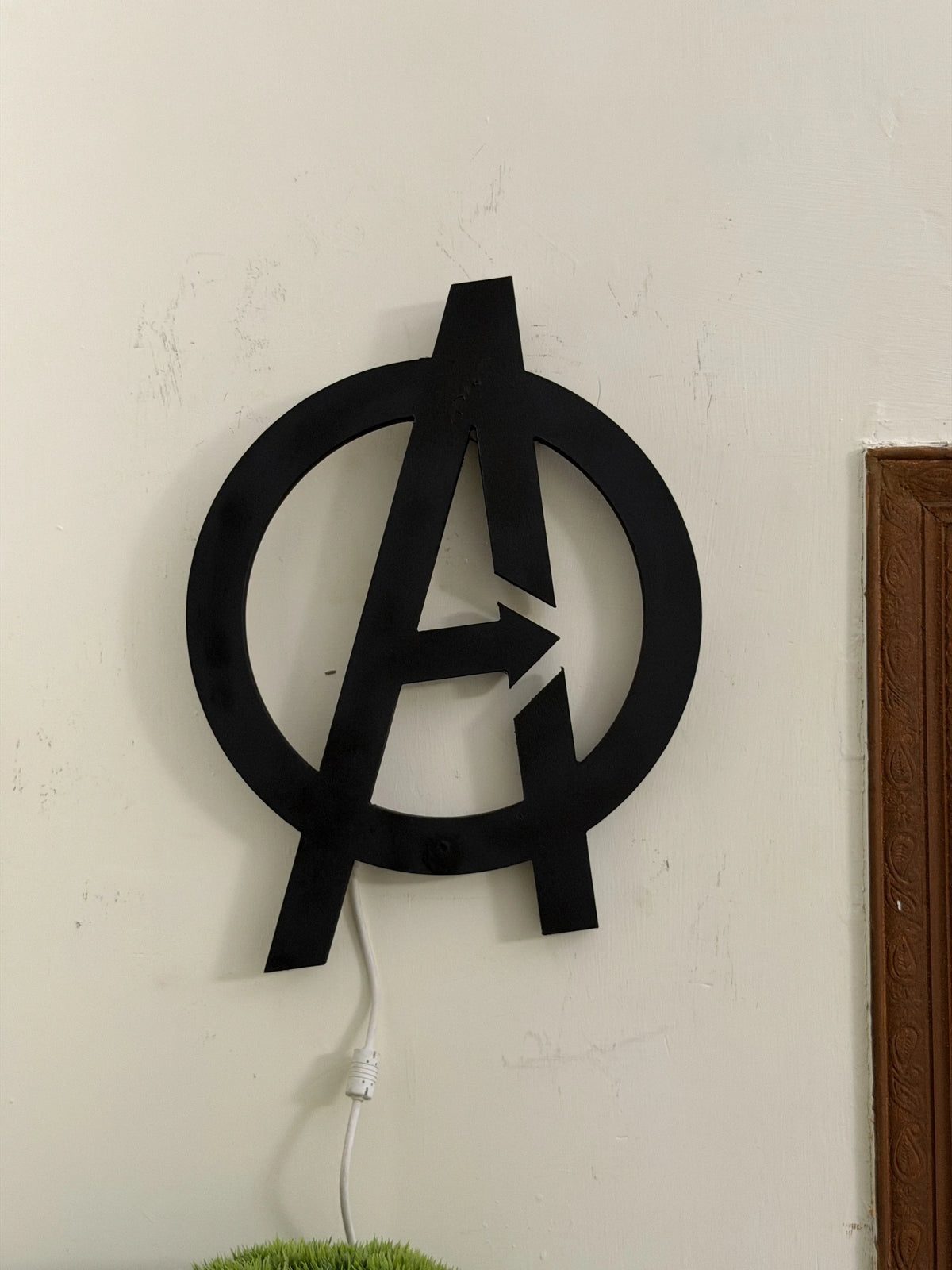Black Spider Logo LED wall decoration by Evertrend, illuminated Avengers logo wall art with vibrant lighting effect.