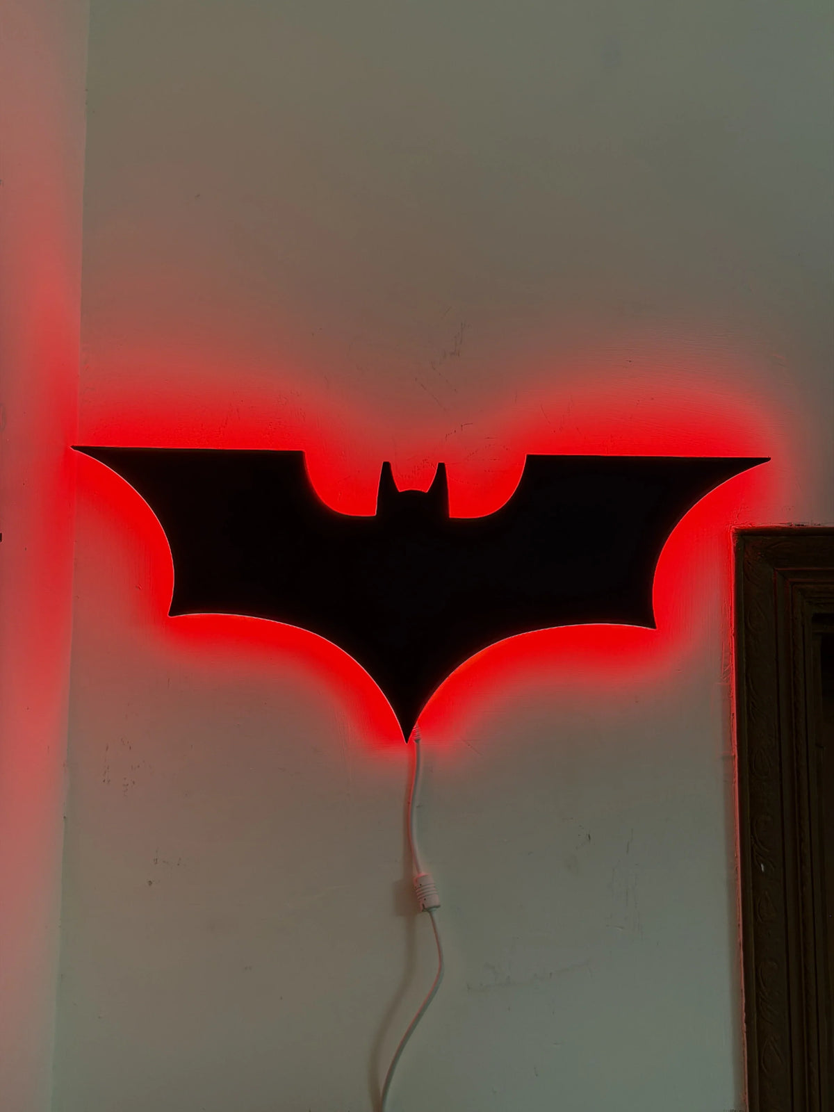 Black Batman logo LED wall decoration featuring a spider emblem, illuminated with bright LED lights for a striking display.